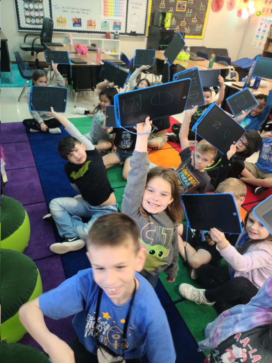 MrsA_Foster's tweet photo. We love using the Boogie boards to practice drawing and labeling fractions!! @ElemRob @robinson_ef #robinsonisd https://t.co/iinJwdeGPM