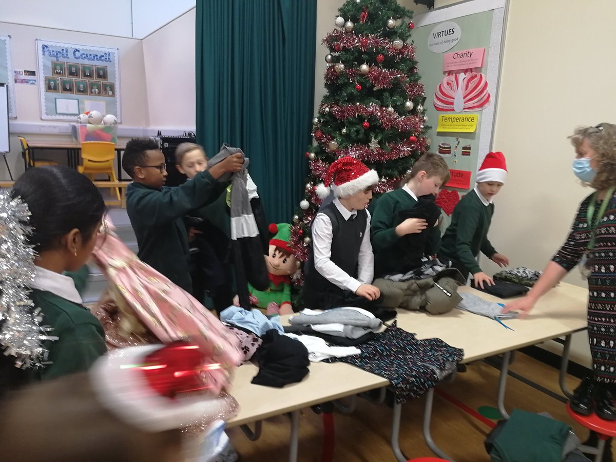 StPaulsHam's tweet photo. Today was our first Fun Friday of Advent. As part of it, we had a Christmas clothes swap. The boys and girls loved finding new clothes along with helping others. @SLCEquity @SLCDirectorofEd #firstweekofadvent #funfriday https://t.co/c0dd9psPJV