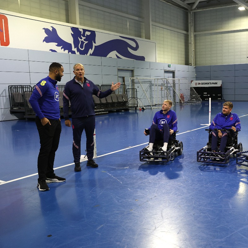 England's tweet photo. Here's what happened when @jbolding8 and @CGordon_90 from our Para Lions were joined by @AaronRamsdale98 and @BenChilwell to introduce Powerchair football to a new audience 👊