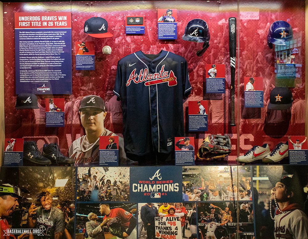 baseballhall's tweet photo. The World Series champion @Braves are officially on display in Cooperstown!

Artifacts from the 2021 World Series will remain in our Autumn Glory exhibit through the end of the 2022 postseason.

https://t.co/ZI3ciwXhN1 https://t.co/Y1bHbCahjX
