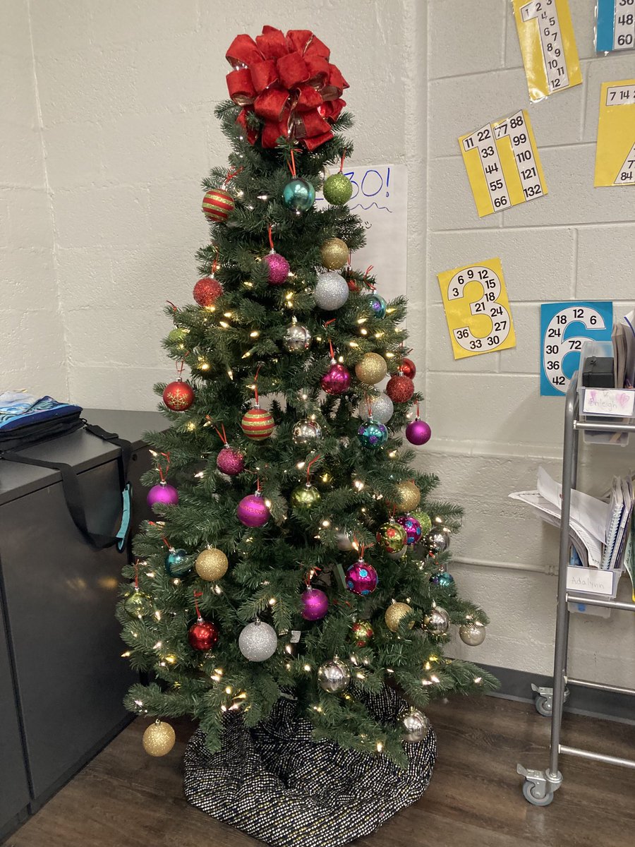 ADawnMericle1's tweet photo. We were so excited this morning! One of our students wrote a letter to Santa yesterday about our missing elf and it worked! She arrived 🥰. We also have a surprise/ mystery tree. Did our elf bring it? 🤷‍♀️❤️ https://t.co/fwBiZJJapu