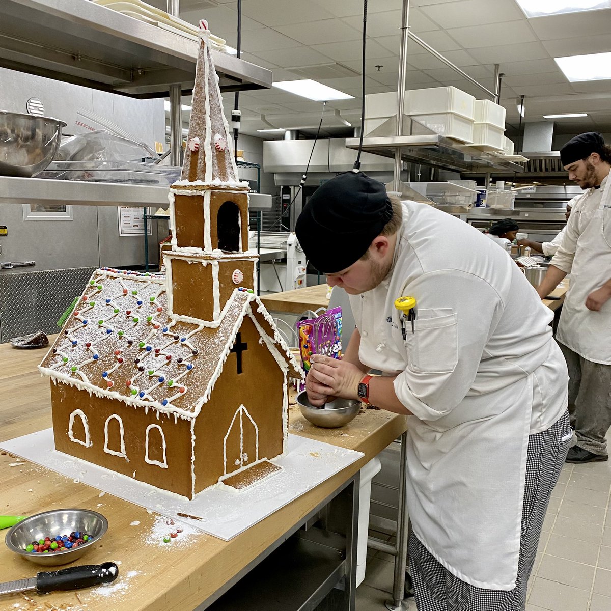 FrancisTuttle's tweet photo. It’s the most wonderful time of the year 🎶 Our #culinary students are hard at work putting the finishing touches on their #gingerbread village. Be sure to stop by the commons next week to see their amazing work! ❄️ https://t.co/WHmychoOgP