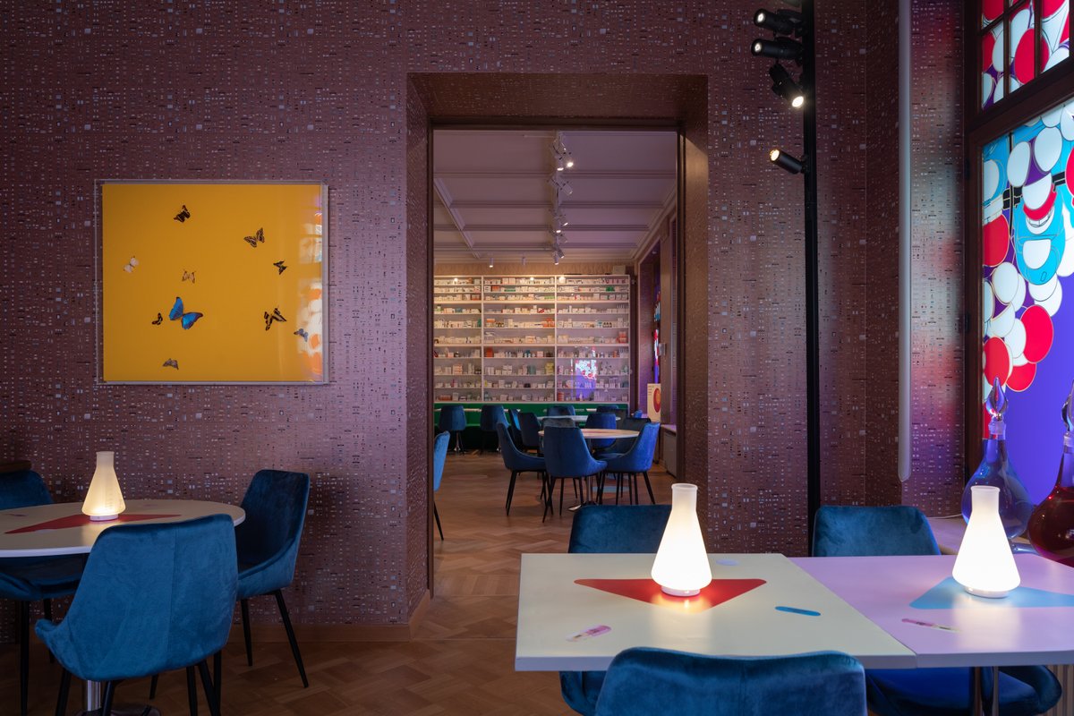Prada's tweet photo. “Pharmacy,” is a temporary installation by @hirst_official of floor-to-ceiling medicine cabinets, butterfly paintings, furniture, and a restaurant, all specially designed for #PradaModeMoscow.
The installation is open to the public December 5 - 11, 2021.
https://t.co/l0clpi0BbY https://t.co/JL5zVo2pYz