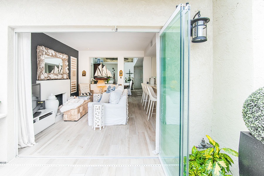 Folding glass doors can truly transform your home or business like no other sliding glass door system.  #livingroominspirations #myinstahome #showoffyourhome #homerenos