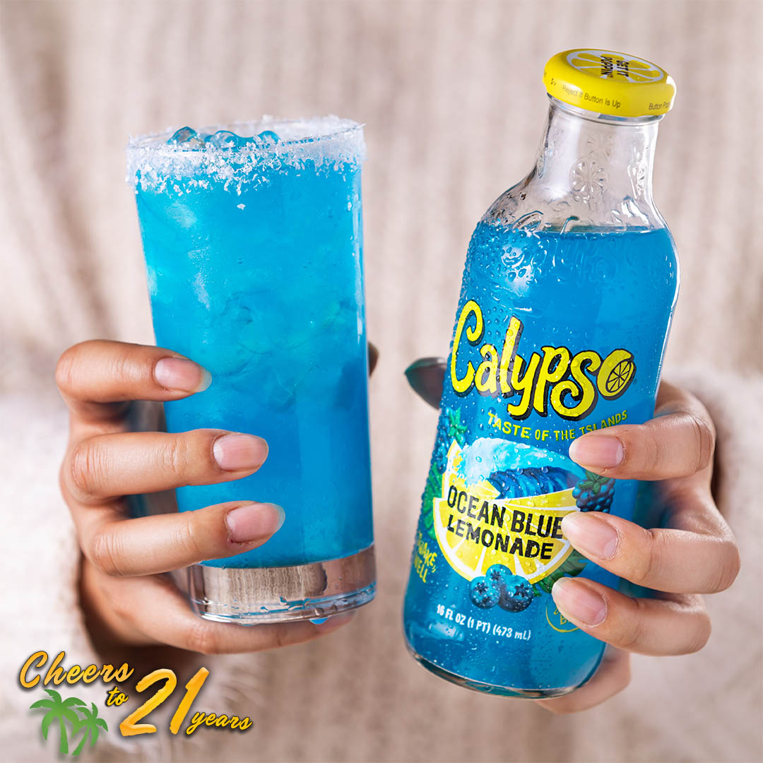 DrinkCalypso's tweet photo. CHEERS TO 21 YEARS! An island treat with a touch of holiday cheer, The Blue Frost! 3 parts Ocean Blue Lemonade, 2 parts Coconut Rum, Splash of Pineapple Juice, Ice, Rim Glass with Coconut. RT for a chance to WIN a 21st Birthday Party Pack. #CheersTo21Years #TasteOfTheIslands https://t.co/KsVlC3t8QF