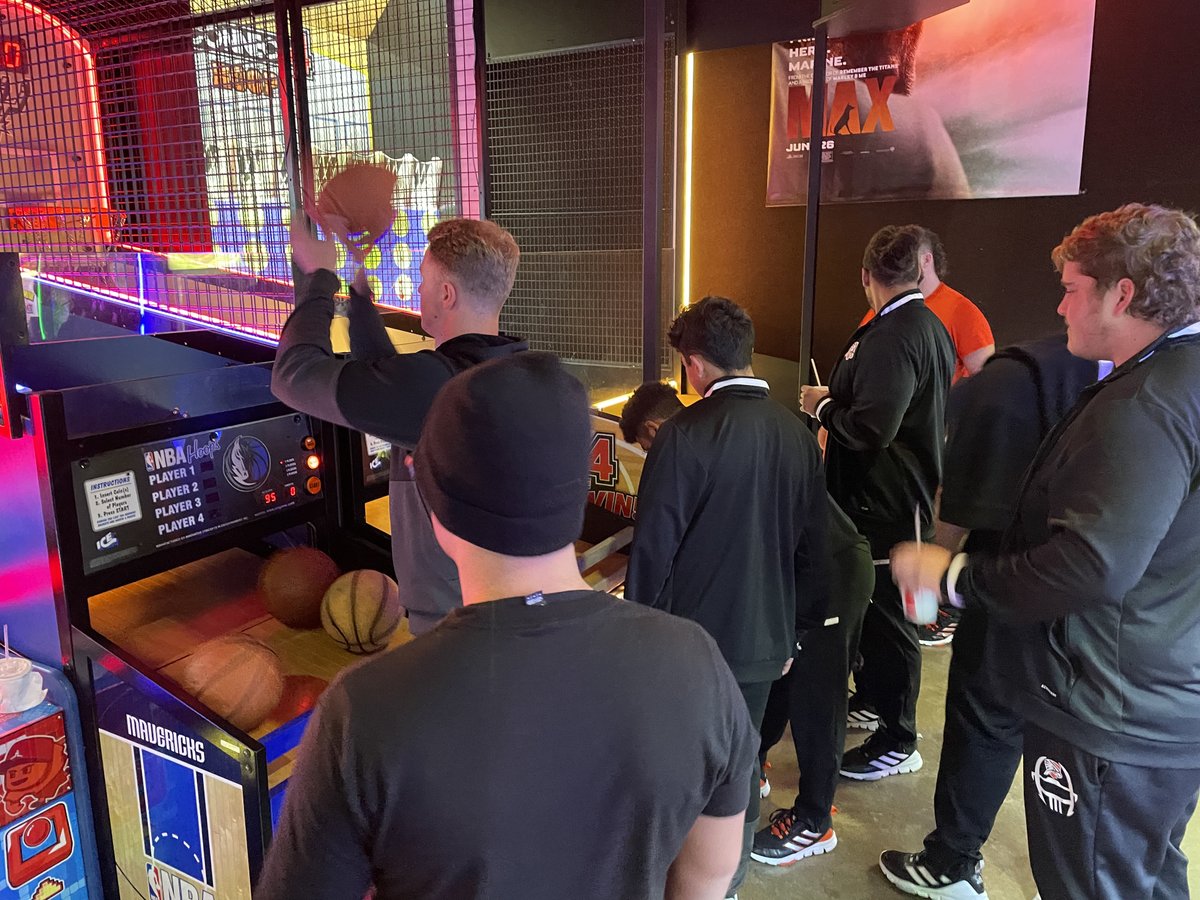 HeritageBowl's tweet photo. @UTPBFootball enjoying the games at Schulman Movie Bowl Grille before they watch Venom on the big screen. #funtownrvheritagebowl #funtownrv #corsicana https://t.co/pOwyYytiwB