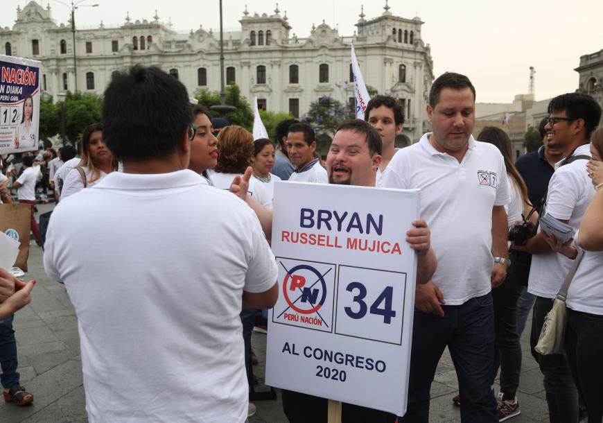2021 Human Rights Watch Marca Bristo Fellow Bryan Russell campaigning at San Martin Plaza in Lima, Peru, December 13, 2019. Russell, who ran twice for Congress in Peru, is now an advocate for the political rights of people with disabilities.