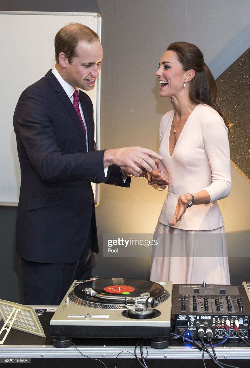 Just adore their laugh. Catherine, Duchess of Cambridge and Prince William, Duke of Cambridge laugh as they are shown how to play on DJ decks at the youth community centre, The Northern Sound System in Elizabeth on April 23, 2014 in Adelaide, Australia.