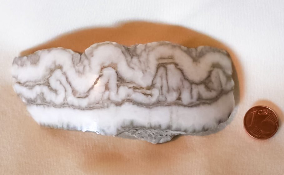 Memories of my time as a geology student: Gypsum with enterolithic folds from central Sicily, April 2002. The hand specimen tells the story of the Messinian salinity crisis ca. 5.6 million years ago, when the Mediterranean sea dried out and left behind a basin full of evaporites.