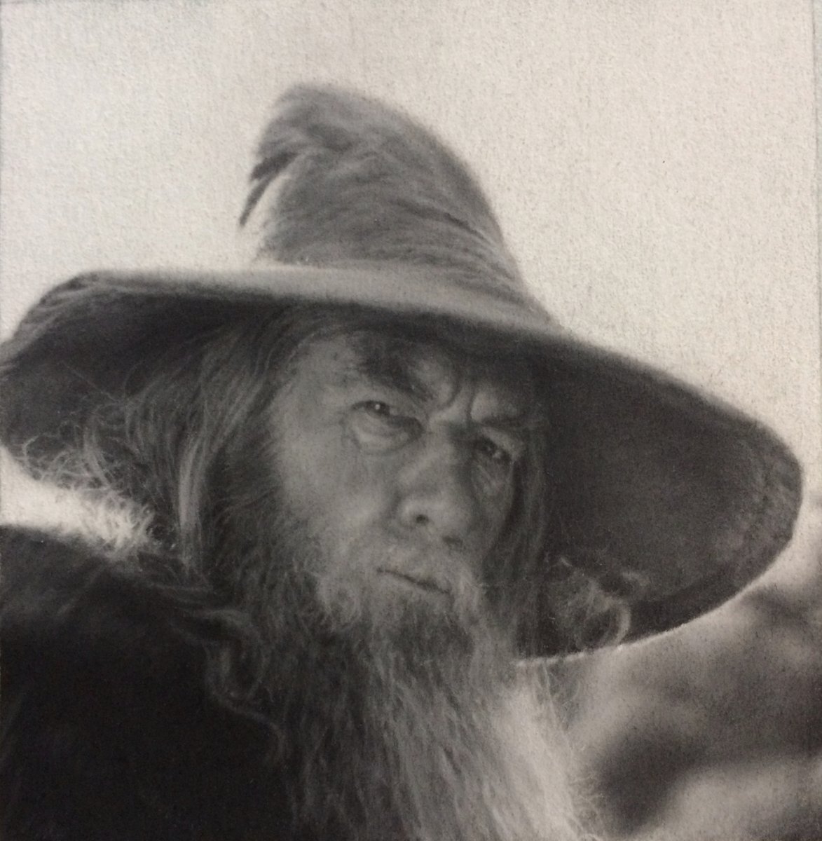 BeAtEasel's tweet photo. "Gandalf," 4"x 4" on pastel paper. Charcoal and white pastel. https://t.co/FPxsR9PIM6