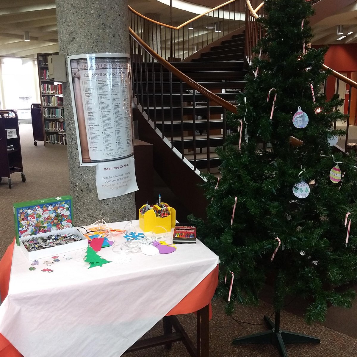 Don't forget to stop by, grab a candy cane, and help us decorate our tree! Color in an ornament or leave a wish for the new year!