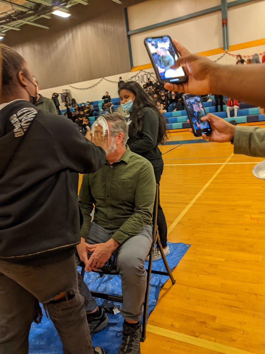 FoxboroughRCS's tweet photo. #FalconPride all around! 
A few of our @FoxboroughRCS  High School teachers &amp; staff - along with Mr. Cournoyer and @LuisSoriaFRCS  agreed to being pied during this afternoon's pep rally! 🥧 It's been a great Spirit Week at the High School! #WeAreFRCS @FRCS2022 https://t.co/ZoLDWzBJuf