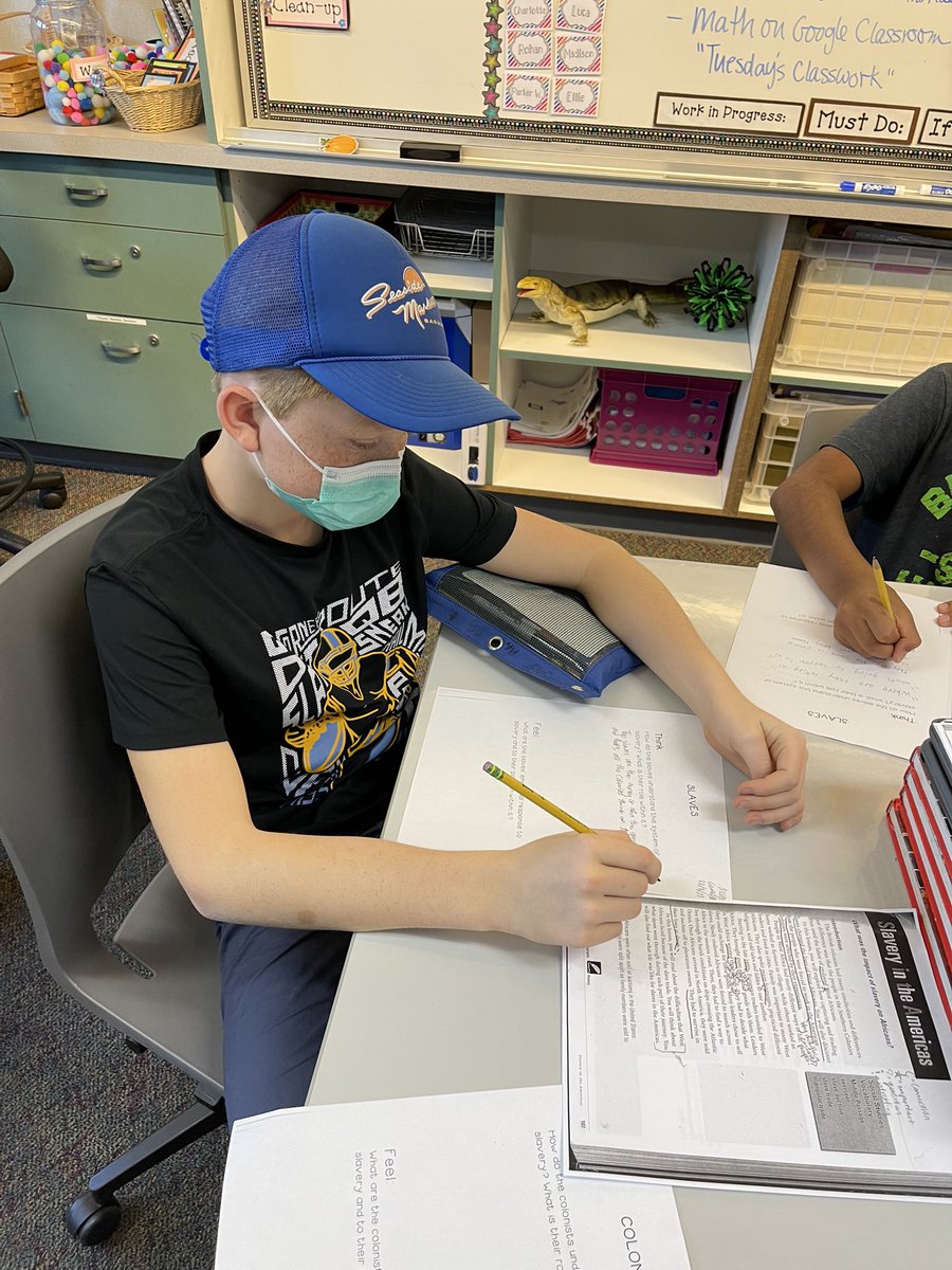 Fifth graders using Think, Care, Feel to analyze relationships between colonist and slaves.