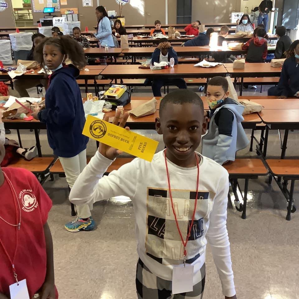 LIESOspreys's tweet photo. Ospreys celebrated the first Friday of the month “Poppin’ with the Principal”, spending some of the Osprey Bucks they earned in November. See some of those Ospreys wearing pajamas? They brought in Toys for Tots today. Great job! #OspreyLove❤💙❤ #ItsTimeToPUSH https://t.co/w2Nsfmtf5Y