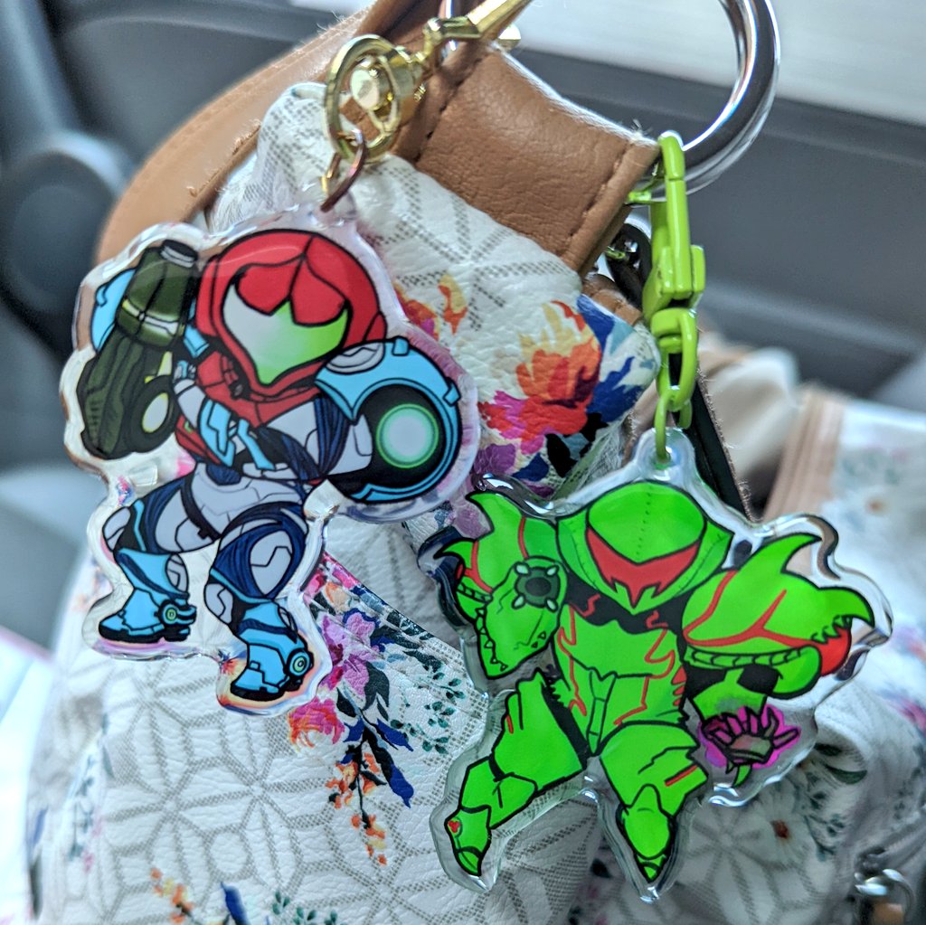 Dana_Nicole_96's tweet photo. My old and new #metroiddread keychains next to each other! They're both available on my Etsy (link in bio)! ♥️💙♥️💚 #metroid #samus #samusaran https://t.co/9DG3WUBpIK
