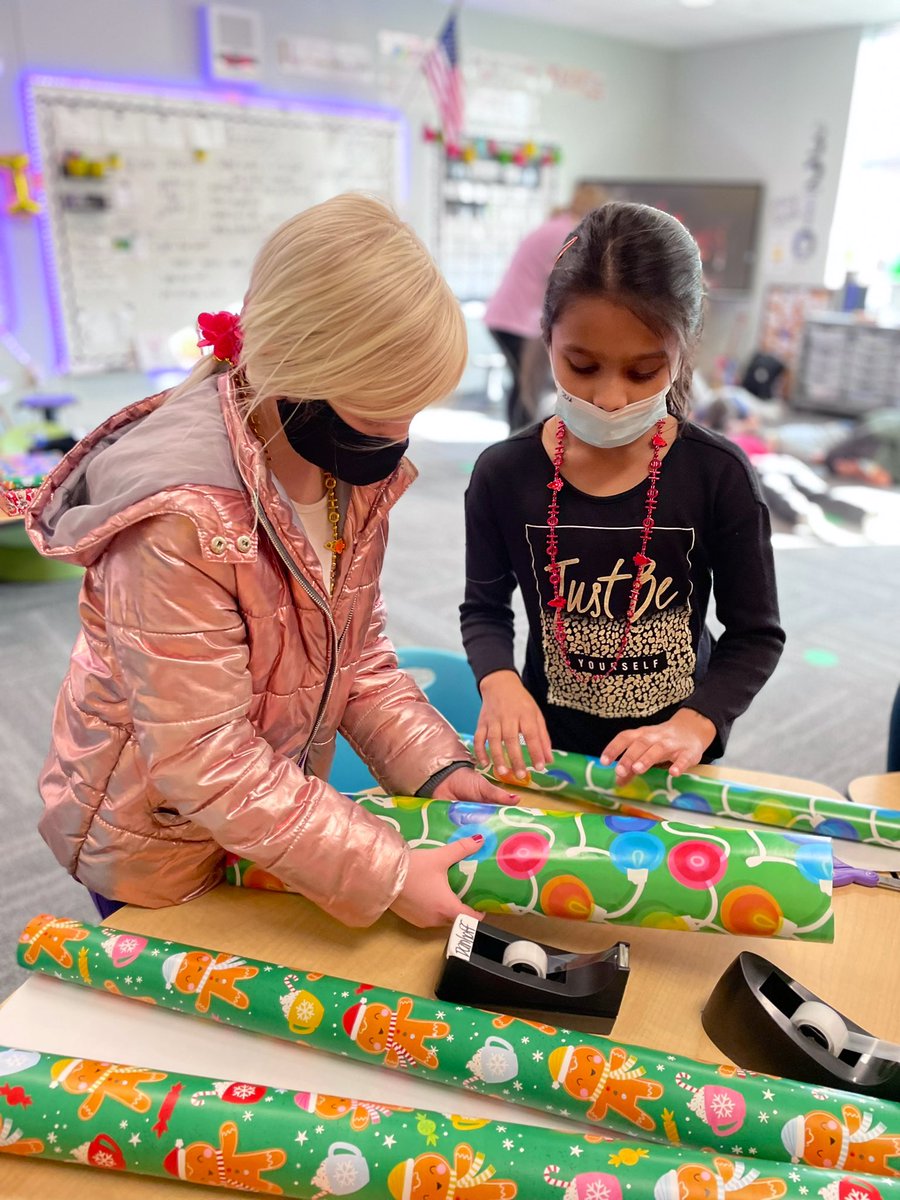 LindseyDanhoff's tweet photo. “How many heartprints will you leave today? Will you share with a friend? Will you give hugs away?” — today we exercised our giving muscles as we wrapped presents for adopt a family during our Winter Fest! @adeDCSD @DublinSchools https://t.co/qYQUNsdzqZ