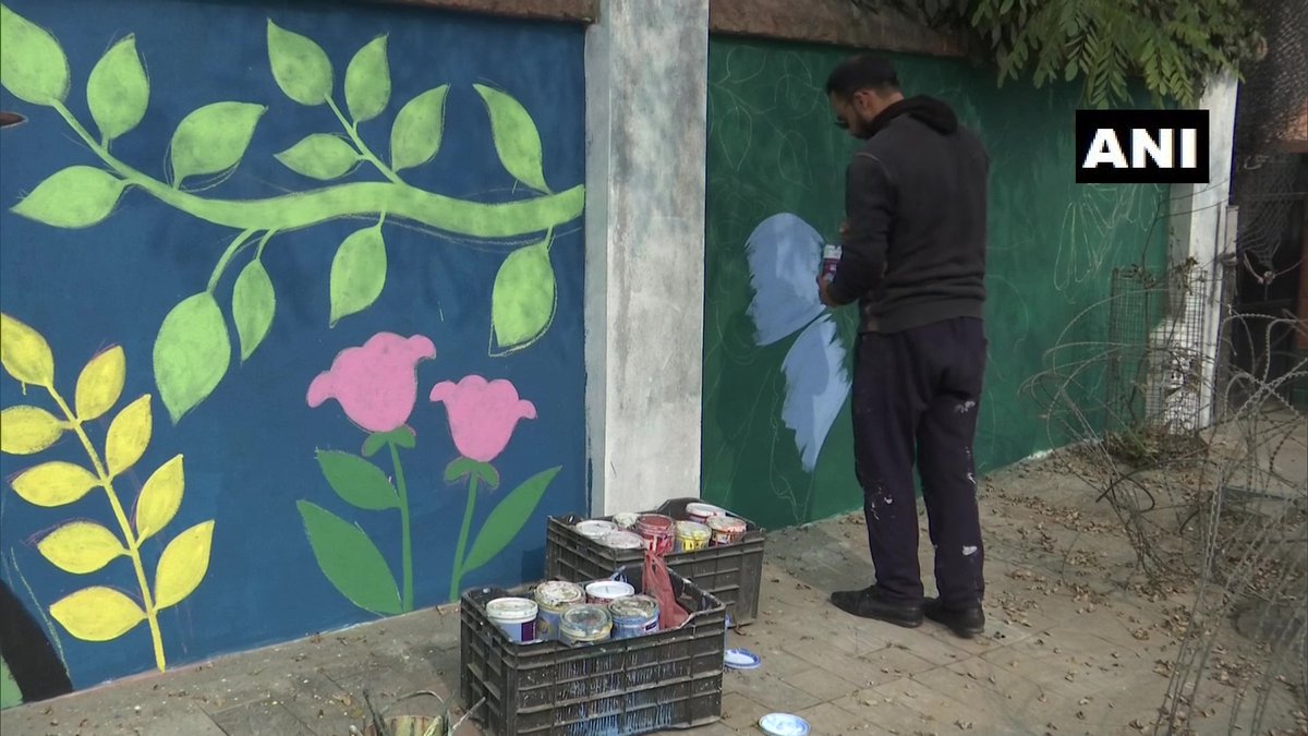 ANI's tweet photo. J&amp;K: Srinagar Municipal Corporation starts beautifying walls of public properties with graffiti artwork in the city

"Graffiti drawing on walls &amp; flyovers is a part of beautification drive under Srinagar Smart City project," Municipal Commissioner Athar Aamir Khan said yesterday https://t.co/l19ReTkEnw