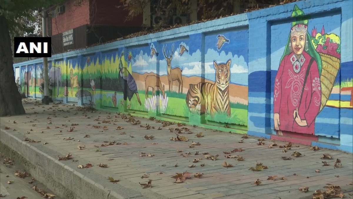 ANI's tweet photo. J&amp;K: Srinagar Municipal Corporation starts beautifying walls of public properties with graffiti artwork in the city

"Graffiti drawing on walls &amp; flyovers is a part of beautification drive under Srinagar Smart City project," Municipal Commissioner Athar Aamir Khan said yesterday https://t.co/l19ReTkEnw