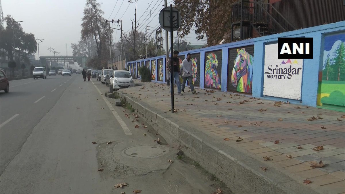 ANI's tweet photo. J&amp;K: Srinagar Municipal Corporation starts beautifying walls of public properties with graffiti artwork in the city

"Graffiti drawing on walls &amp; flyovers is a part of beautification drive under Srinagar Smart City project," Municipal Commissioner Athar Aamir Khan said yesterday https://t.co/l19ReTkEnw