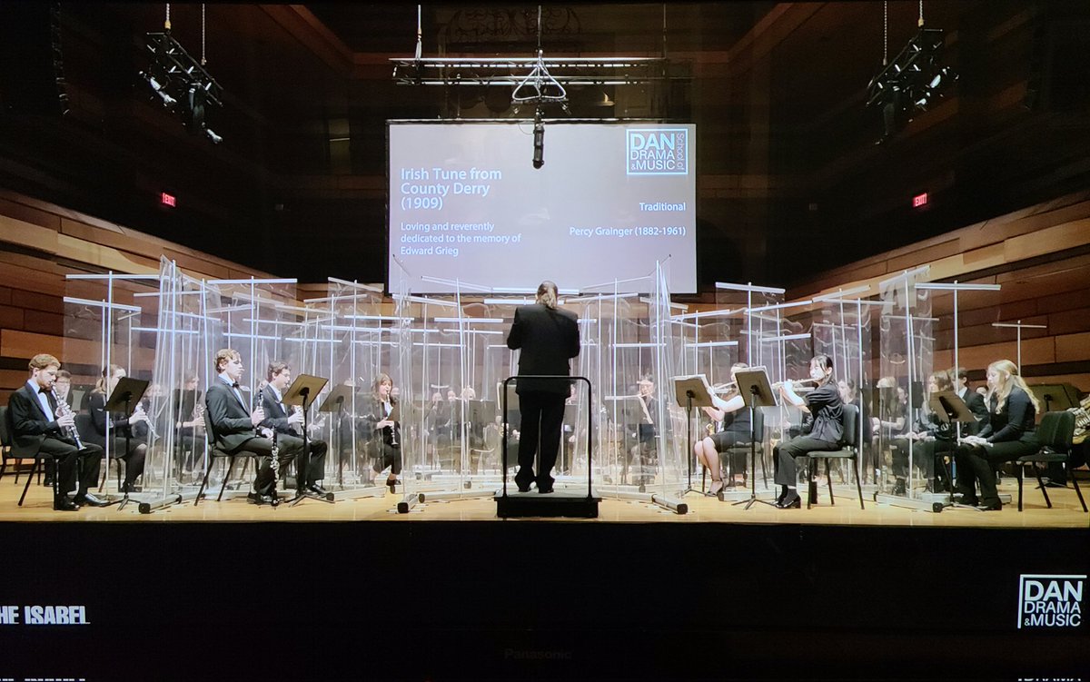 TweetFromHilary's tweet photo. Livestreaming concerts this week from @TheDanSchool @queensu because we can't be there in person to cheer on our percussionist. The entire 4-concert program was outstanding, but tonight's wind ensemble piece, Danny Boy, amidst covid safety shields, was one for the ages.🇮🇪🎼💙💛❤ https://t.co/mOp4DMucjB