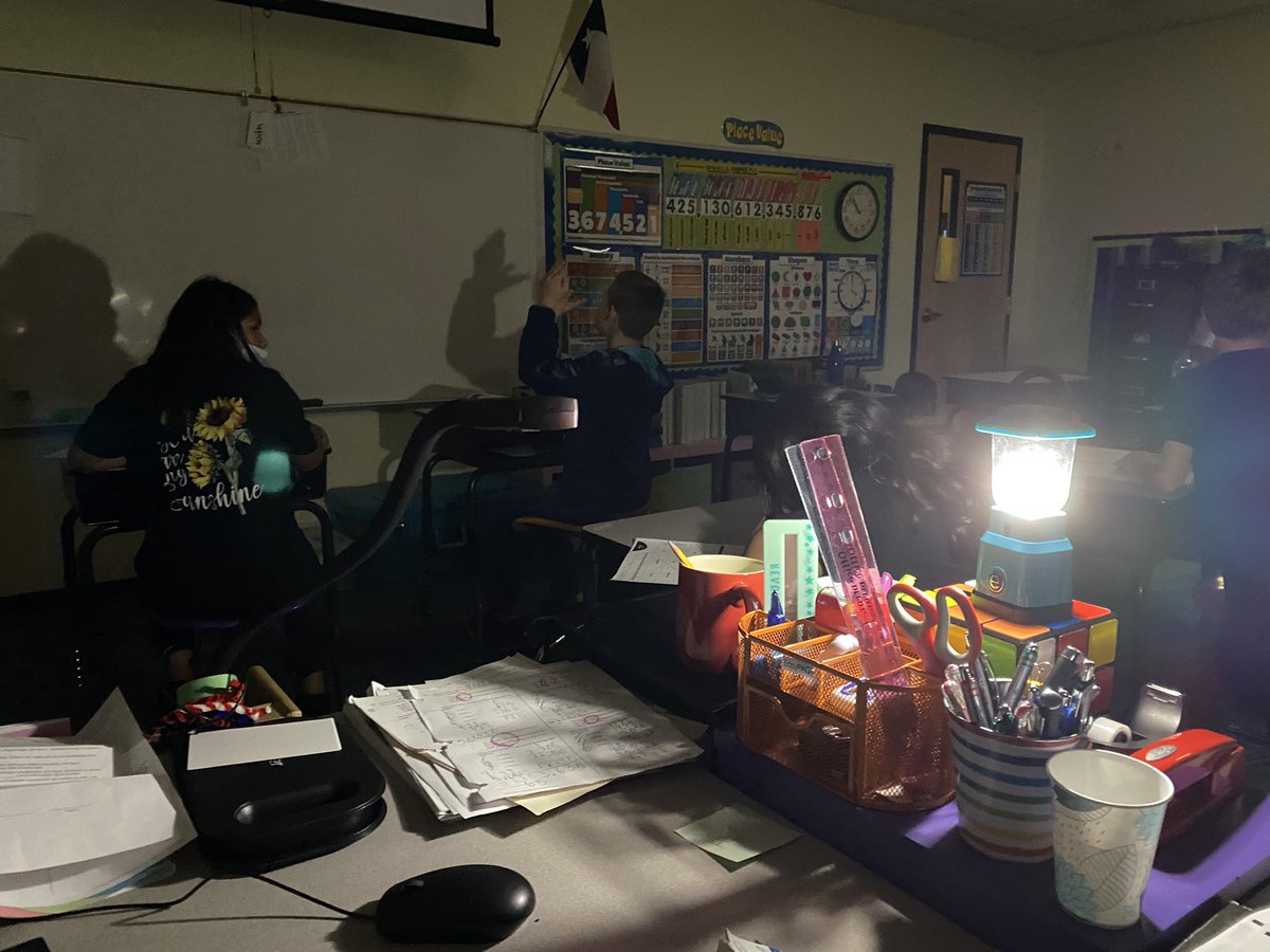SarahLynn2390's tweet photo. @BetoORourke Beto, not only are we underpaid, but Abbot can’t even keep the lights on in our classrooms. Our power was out for 4 hours yesterday. My kiddos had to do their work like this: https://t.co/sDZvj0WZNE