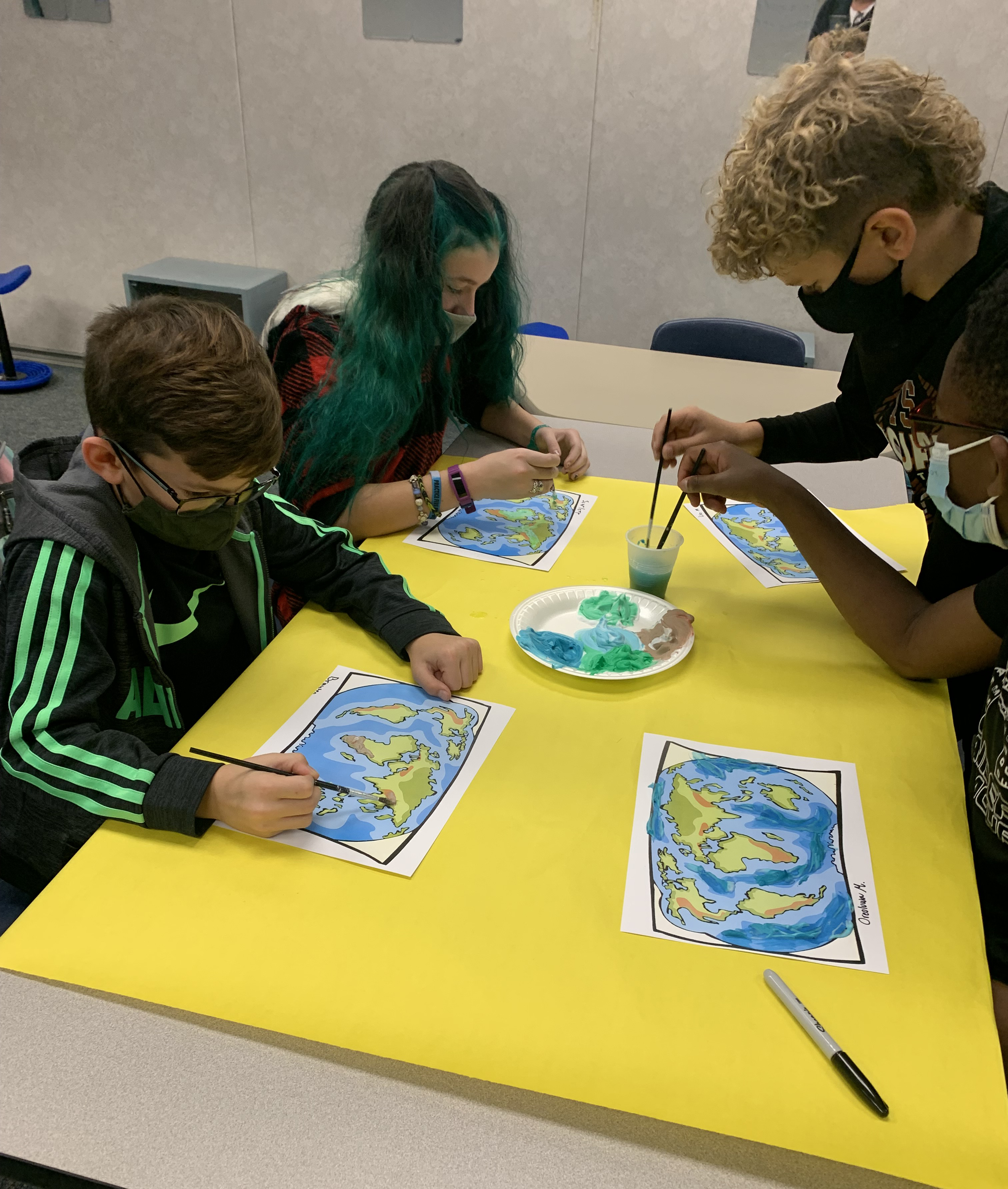 students painting