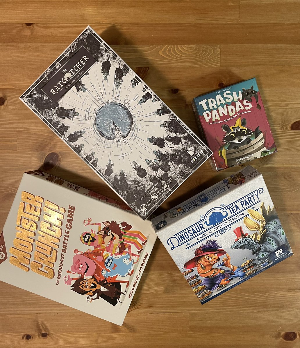 CreakyTable's tweet photo. Board Games for the weekend! They all have drawn us in with their great art and fun themes.

#boardgames #boardgame #bgg #bggcommunity #tabletopgames #ratcatcher #monstercrunch #trashpandas #dinosaurteaparty #dice #cards #meeples https://t.co/Uk9aAAJw3E