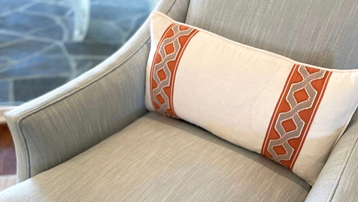 brimarinc's tweet photo. Would you like to have a seat? This one is taken, but @heatherholcombedesigns promises more pics from this project soon. 

Pillow decorated with punchy orange Tanzania border from @brimarinc 

#throwpillows #furniture #interiordesign #trims #decorativeborders #armchair #trimmings https://t.co/t9Qi8hgOps