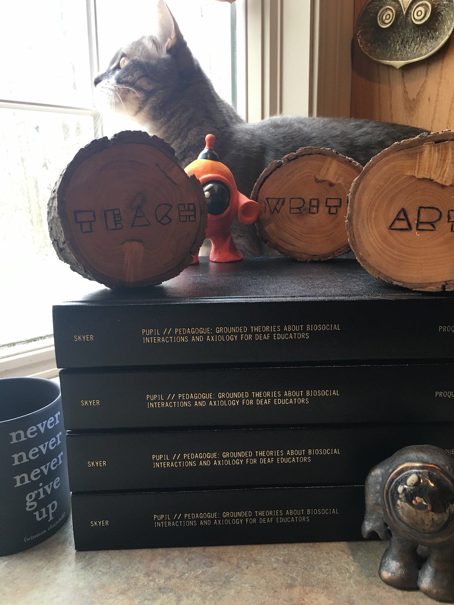 Well, it is finally done. Since I was a kid I've thought about what it might look like and feel like to be an author and stare at a stack of my own books.

Now I know. Also, Internet, meet Kafka the Cat (also: "Kafi"), who was my research assistant on this project. 

#PhDLife