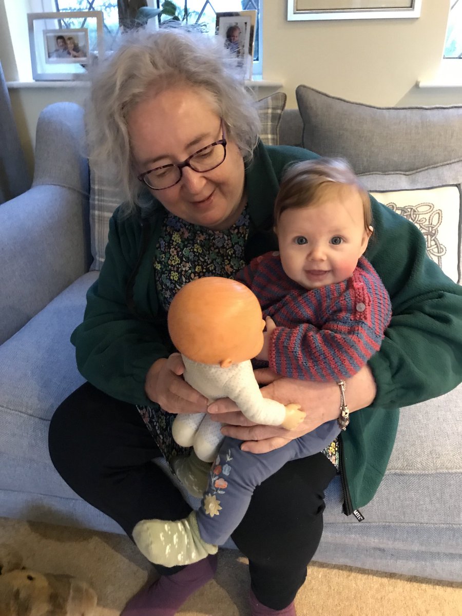 And the beautiful friendship continues - here Grandma ⁦<a href="/francesbell/">Frances Bell @francesbell@mastodon.social</a>⁩ shows O how the doll’s eyes open and shuts. O was fascinated. #Grandma #Grandaughter #family