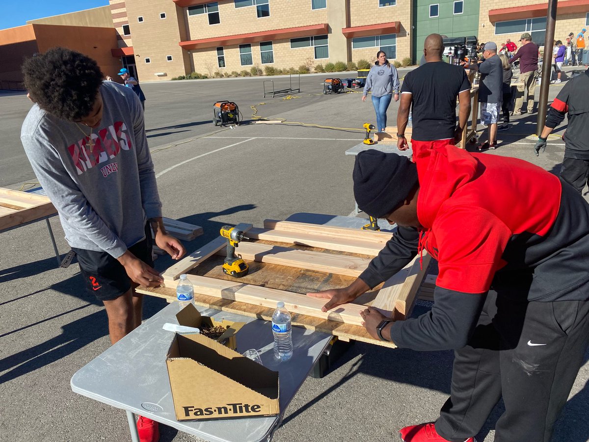 unlvfootball's tweet photo. Great morning building beds for #LasVegas families in need‼️ Thanks @ShpBeds for having us out. #RebelsGiveBack https://t.co/VqmlE4nmgd