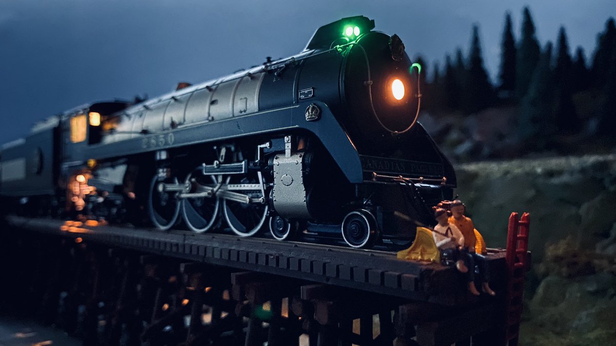 DeltaMRC's tweet photo. The @RapidoTrains CPR Royal Livery Hudson 2850 offers a little light and warmth for some twilight fishing. #modeltrains #deltaBC https://t.co/KT3DQOFdOd