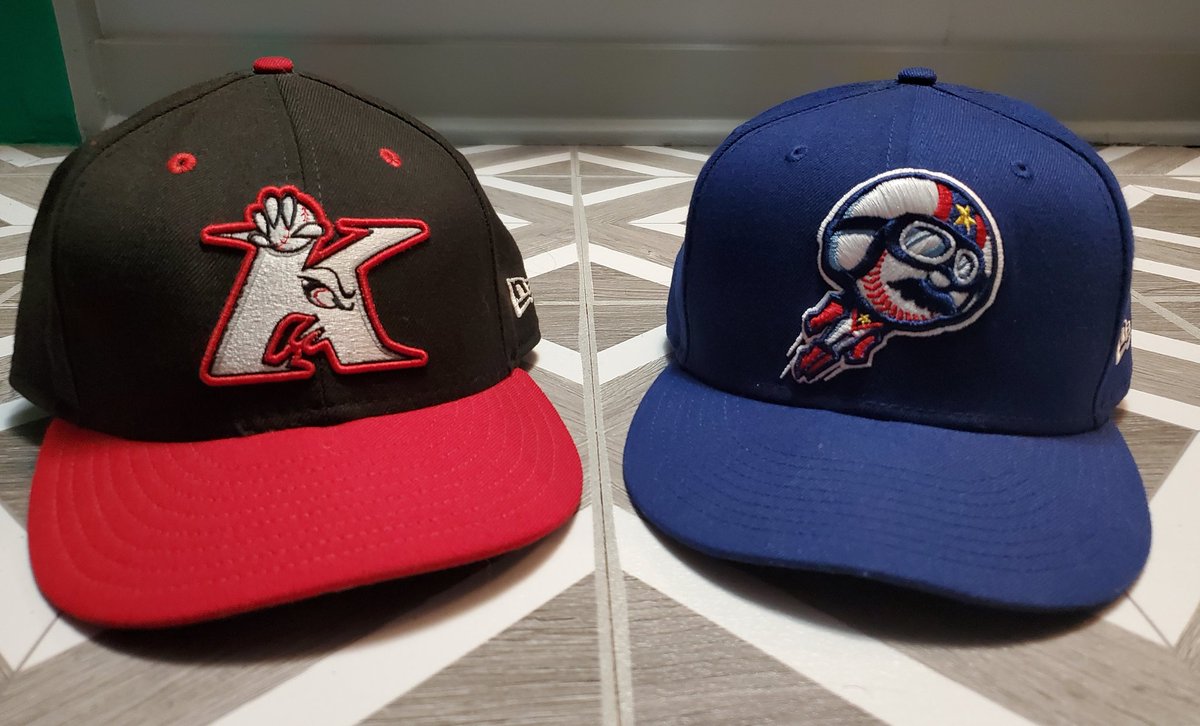 kelabration's tweet photo. Today's #capoftheday is two from Kannapolis, NC. On the left is the Intimidators, which I got in 2004 when I bought all the then @whitesox affiliates. On the right is the @Kcannonballers, which I picked up last year as part of my #SaveMiLB/Covid purchases. #HatTwitter https://t.co/tRZusQzrmZ