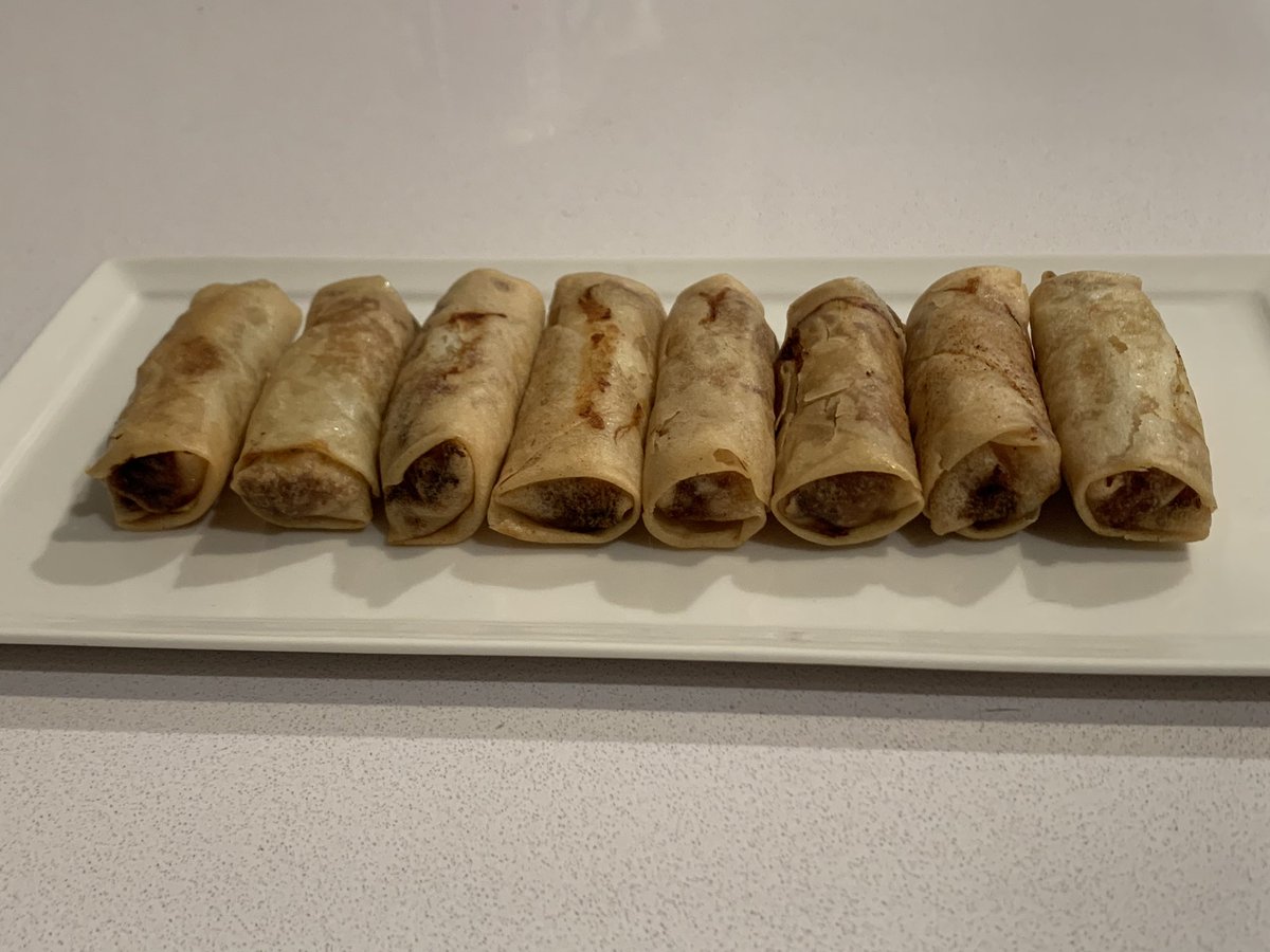 AndreaKStout's tweet photo. When your friend brings you homemade eggrolls…. 😋 @robertbanh https://t.co/nZVWb34F1S