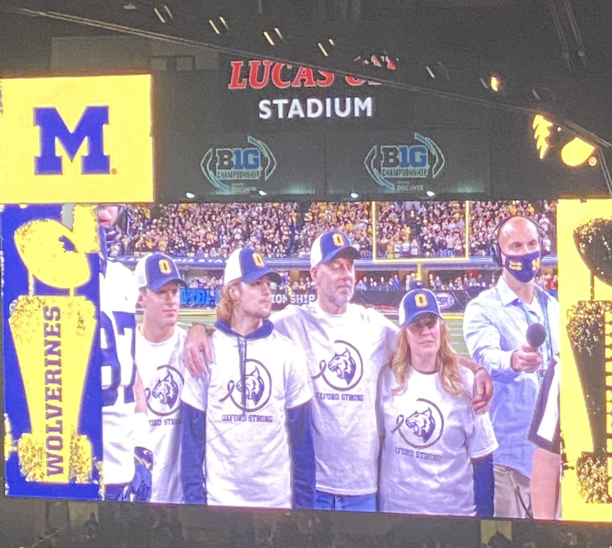 BradGalli's tweet photo. The family of Tate Myre serving as Michigan’s honorary captains

Tate was a victim in the Oxford shooting. https://t.co/LH4H73Gemz