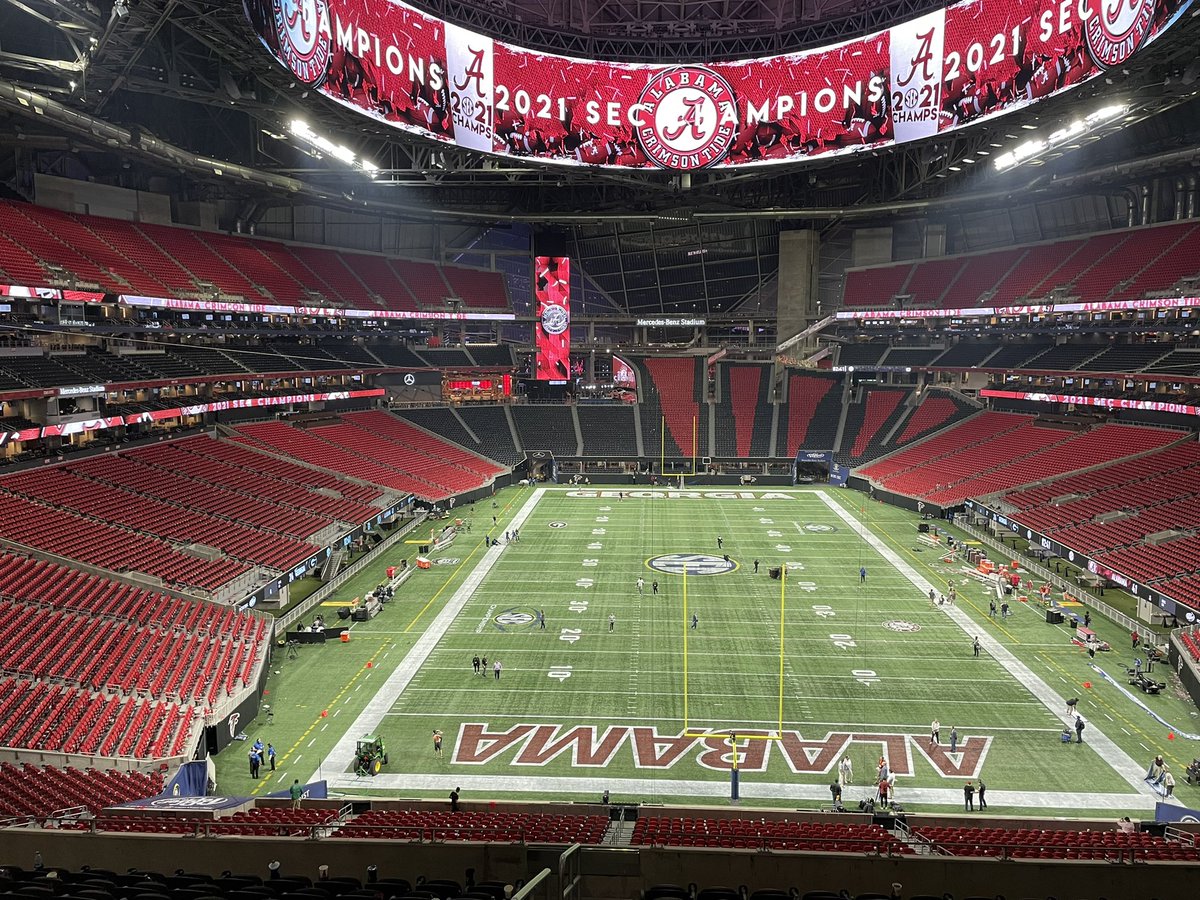 BlevinsSam's tweet photo. That’s all she wrote for the 2021 #SECChampionship ! The Benz grounds crew is out taking all the SEC logos down getting ready for the @AtlantaFalcons game tomorrow at 1! Our coverage continues tonight on @WRCB at 11! #SECon3 https://t.co/vsdXfZkb88