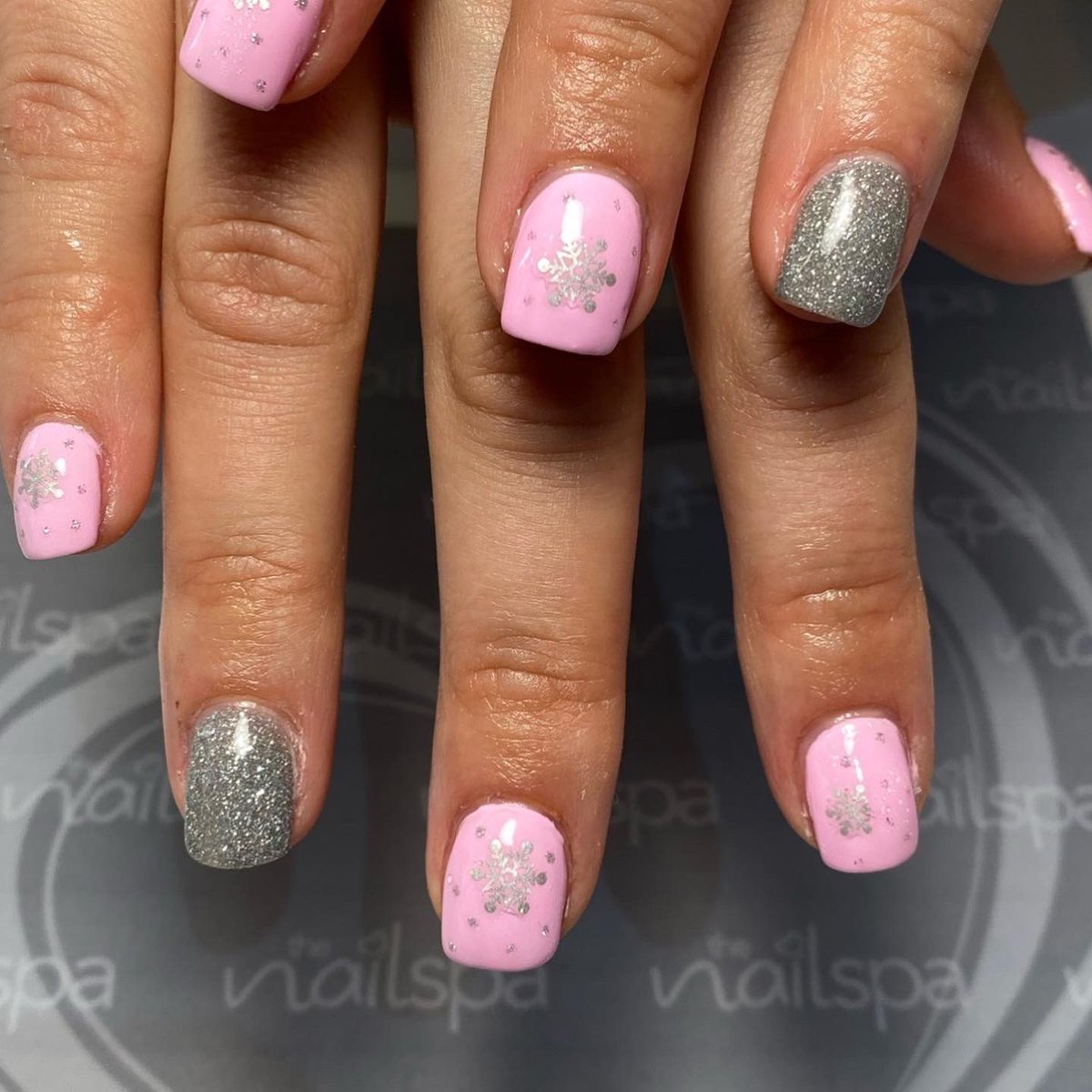Nailspachester's tweet photo. It’s not all about the red nails at Christmas! Why not have some pink with glitter and snowflakes! https://t.co/ZMUZcVcNAc