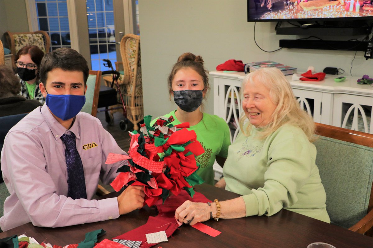 InterFaithCNY's tweet photo. Thank you to the @CBASyracuse high school students who are participating in our One to One Program. This month they visited Peregrine at Onondaga Hill and made fabric wreaths together for the holiday season! #SeniorServices #AffirmDignity https://t.co/rYJHQDc0ls