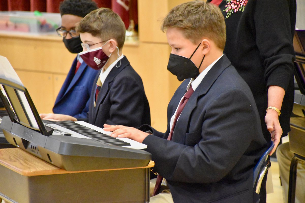 BoysLatinSchool's tweet photo. This morning the middle school had their first musical performance in two years! Congratulations to our middle schoolers who performed in the holiday concert. Well done boys! #BoysLatin #BL #OneBL #EQV https://t.co/QjID4akJuj