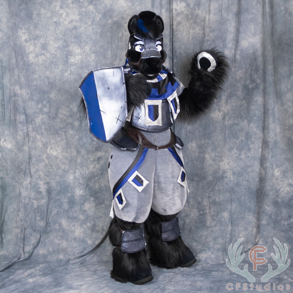 P0Eproductions's tweet photo. Meet the NOBLE STEED! 🛡️ She's an artistic liberty "knight's horse", 100% designed by us! ⚔️ She features some lovely hand sewn spots, custom tack, plus armor &amp; a shield made of our Armor Foam. We are SO proud of this suit and hope she gets a lot of love! 🖤💙🖤💙#FursuitFriday https://t.co/LpK2Xr1me3