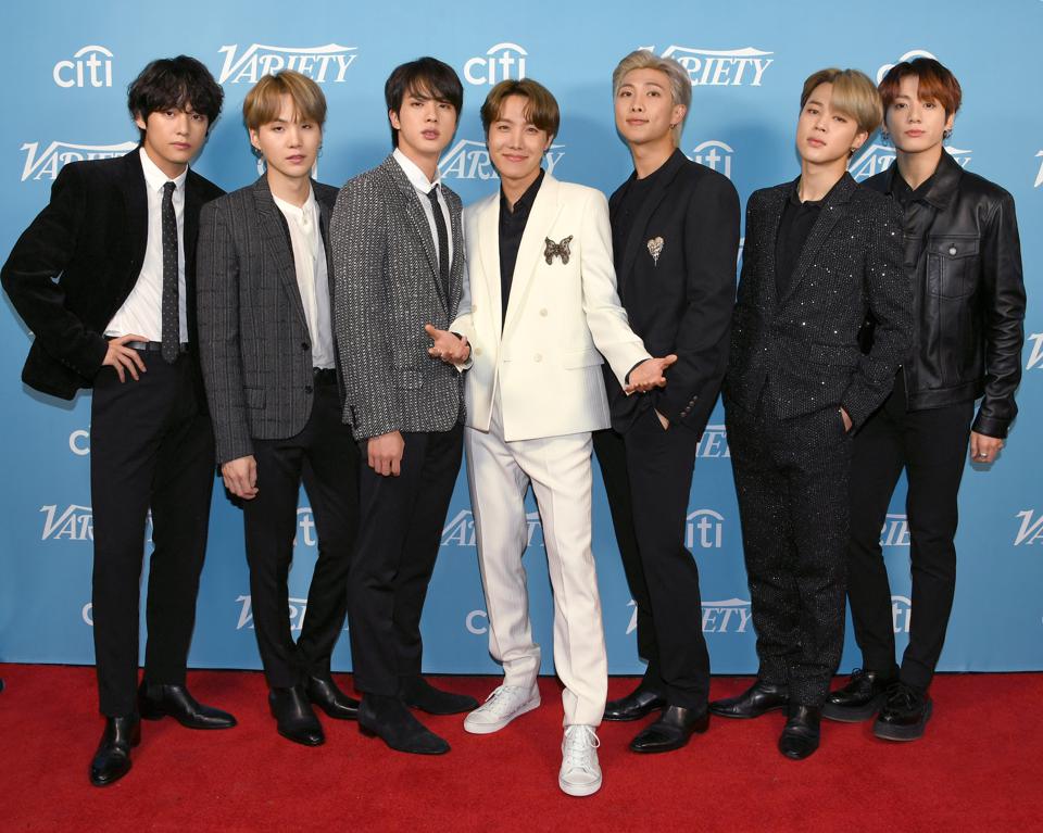 Forbes's tweet photo. BTS Members Suga, Jin, Jung Kook And V Are Making The Most Of Their Band’s Break By Dropping Solo Music https://t.co/PcUuMRKdDb https://t.co/5ATyoIOQlf