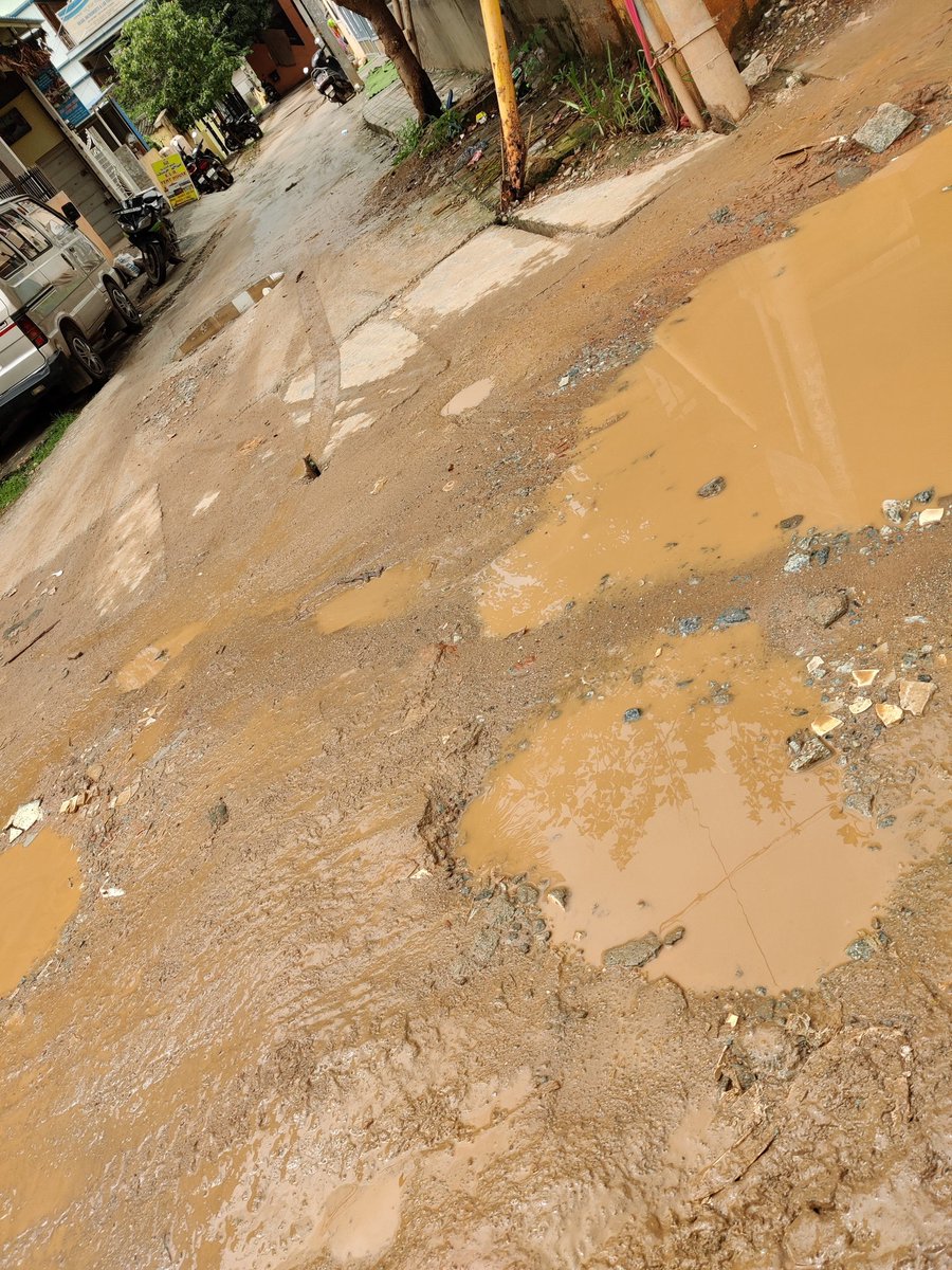 helpgnrgarden's tweet photo. Welcome to Babusa Palya, Flower Garden Road (ironic) to enjoy dirt bike racing, Day 15. @BBMPCOMM can you please acknowledge. @CMofKarnataka, this is @BABasavaraja, urban minister's constituency. Please see the money allocated for these roads. https://t.co/HyBNOWZW9E