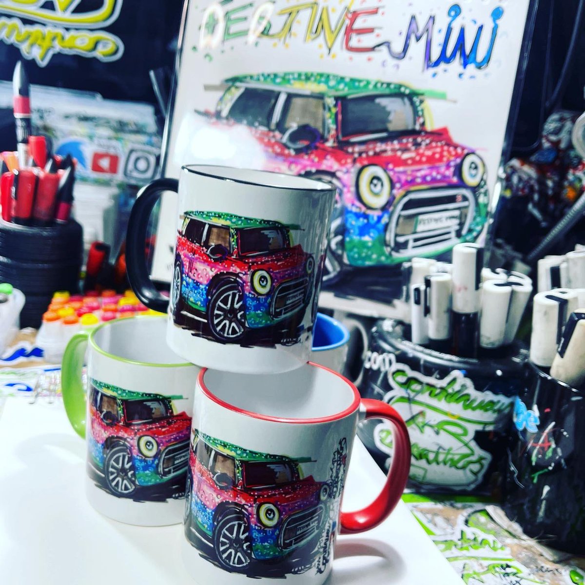 Popbangcolour's tweet photo. Ho ho ho! 🎅🏼🎄

The #FestiveMINI mugs have arrived! Last week @drivingwithnico ‘s @MINIUK was created as a #ContinuousCar drawing @SilverstoneUK ‘s #LapofLights 

Here it is on a colourful quartet of mugs, Watcha think to ‘um? 

🚗+✍🏻 #MINI https://t.co/bvE8dypqGq