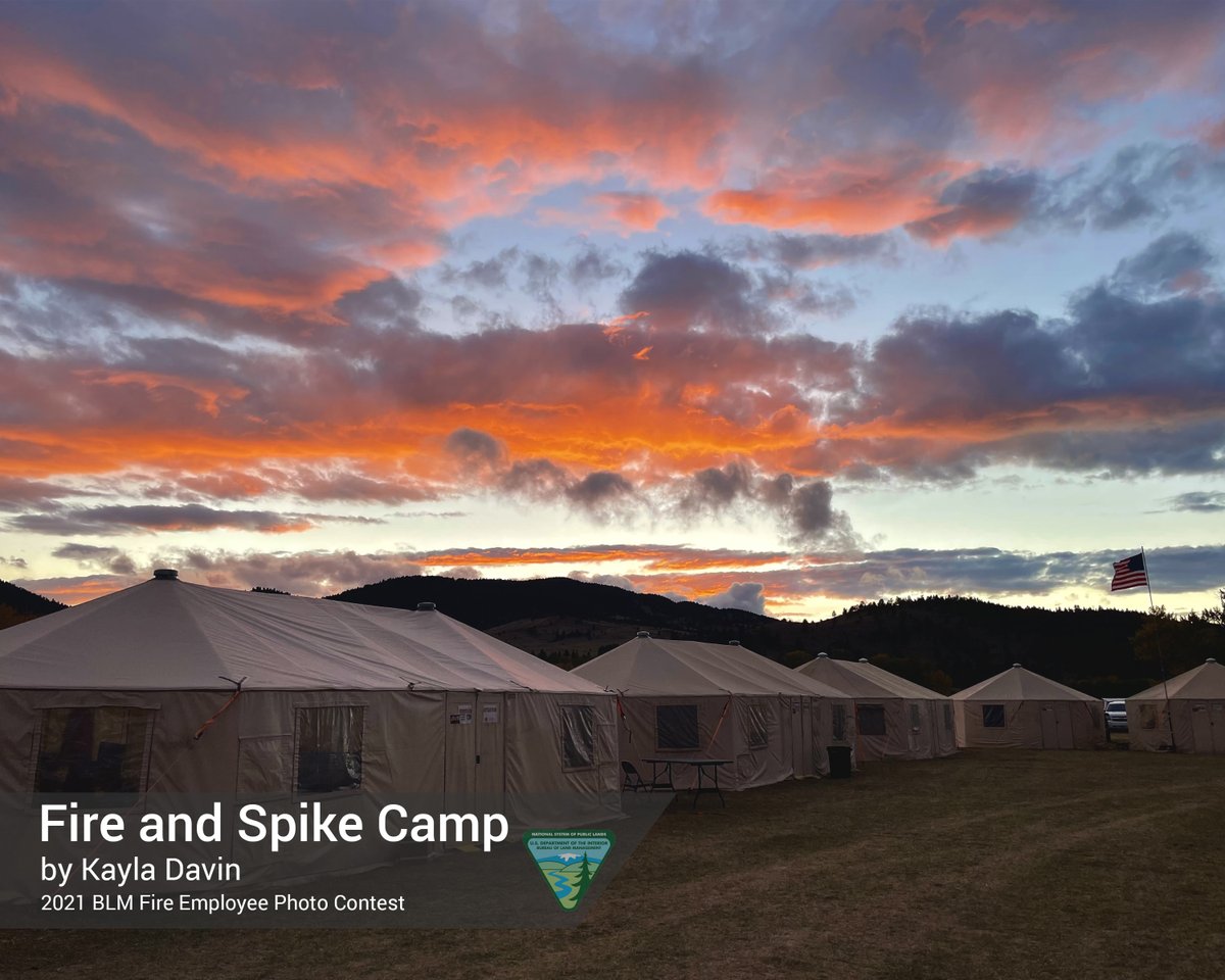 BLMFire's tweet photo. On the 5th day of the #12DaysofEmployeePhotography, Kayla Davin wins the fire camp/spike camp category with this picture of the incident command post, or ICP, at the #HaystackFire during #FireYear2021. #HappyHolidays, we hope you’re enjoying the BLM Fire Employee Photo Contest. https://t.co/UwC08Vvrrv