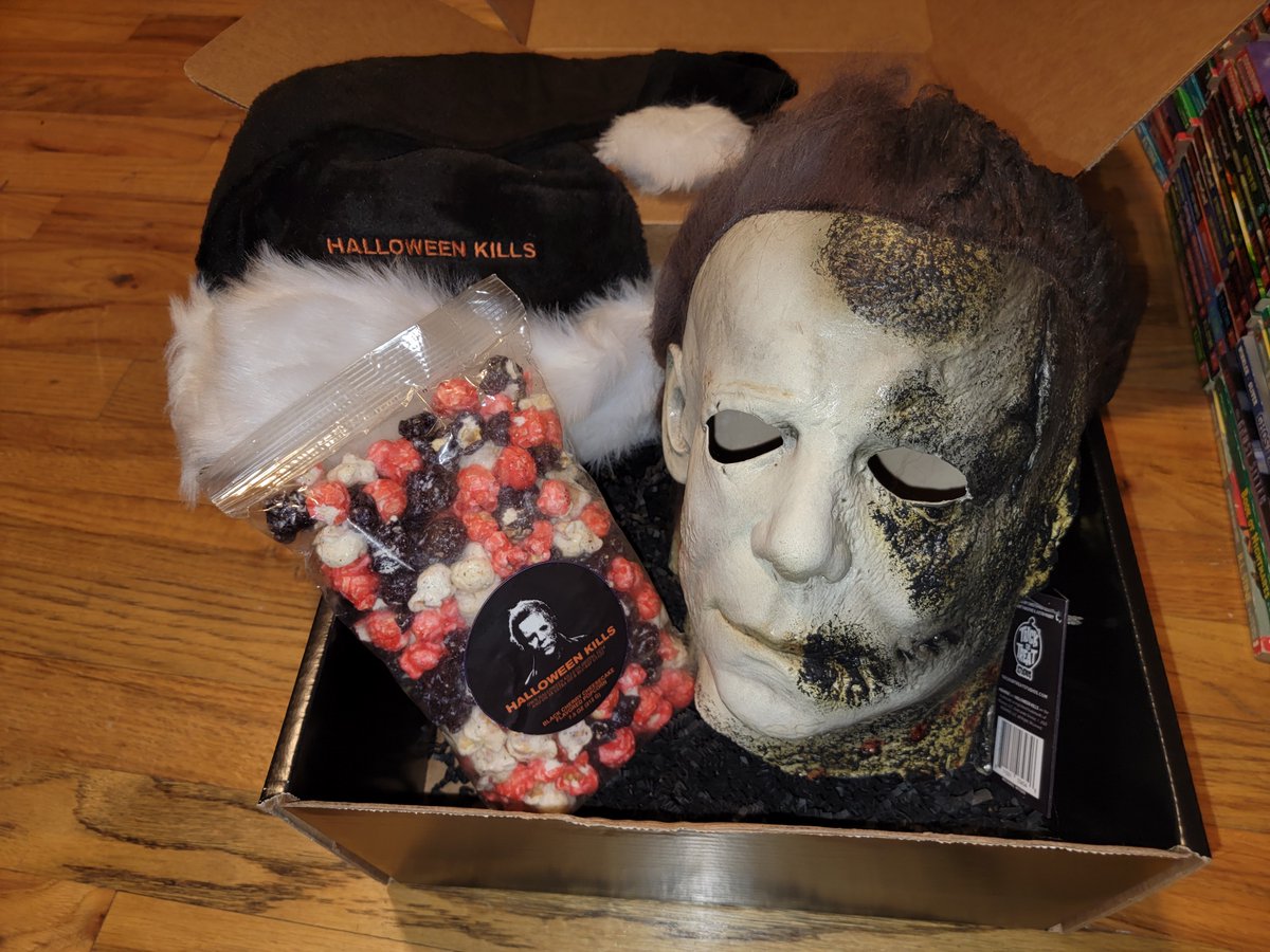 Delivery from Haddonfield today brings me a Michael Myers mask, candy, and Halloween Kills Santa hat(!), and it brings YOU a digital code for the new Extended Cut. All you have to do is follow me and RT this tweet. I will pick a winner next Monday! #HalloweenKillsAtHome