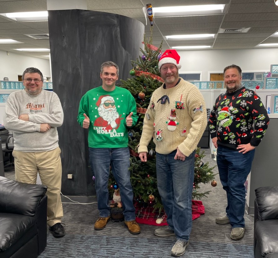 corporatecomm's tweet photo. Happy #NationalUglySweaterDay!
That's a great-looking group of ugly sweaters right there. What a fun day!
And the winner for ugliest, heaviest, and itchiest sweater... Our Creative Director, Bren! (extra points for the hat!)
#HappyHolidays #CoolSanta #Reptar #Roc https://t.co/SFr5sz54gC