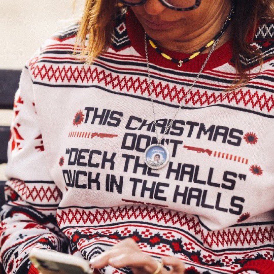 ChangeTheRef's tweet photo. Thousands of Americans die every year due to gun violence. This series of the #UgliestChristmasSweaters illustrate the hard truths our society faces. It’s on us to demand that effective measures are taken. #NationalUglySweaterDay https://t.co/A27u8OGjLc