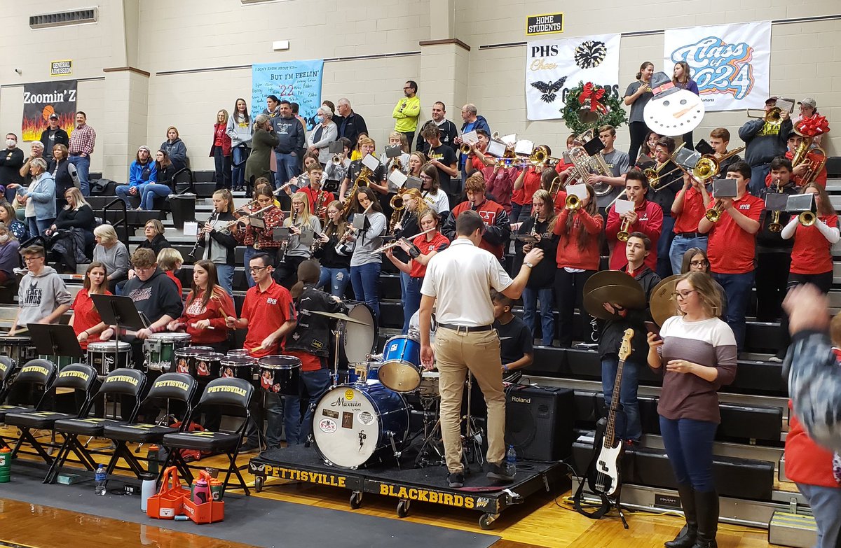 The Pettisville High School and Hilltop High School pep bands combine their talents as their girls' teams play each other this evening at Pettisville.  The pep bands played together at the boys' game at Hilltop last evening.  The combined pep bands sound AWESOME!!!