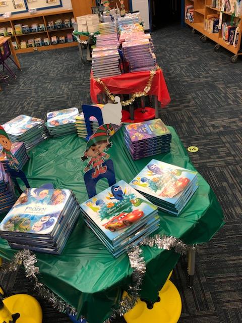 CesMedia's tweet photo. It was the Holiday Book Giveaway in my media center today! All K-3rd grade took home a Disney Collection story book. 4th and 5th took home two books!!! #cesmediaglitter #chaireselementary #bookfairyandSkoobteamup https://t.co/YpGobPIaVb