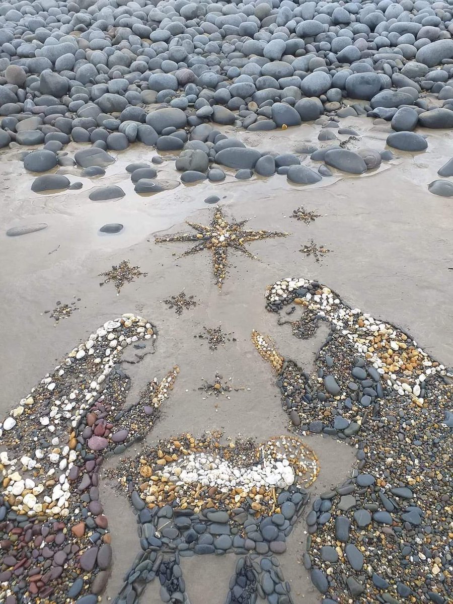 The birth of baby Jesus, made from stones on a Devon beach!

Credit: Beach4Art